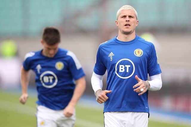 Lyndon Dykes of Scotland looks on as he warms up prior to the international friendly match between Luxembourg and Scotland at Stade Josy Barthel on June 06, 2021 in Luxembourg, Luxembourg. (Photo by Christian Kaspar-Bartke/Getty Images)