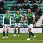 Hibs players prepare to take centre after conceding to Dundee United in the 3-0 defeat at Easter Road. (Photo by Ross MacDonald / SNS Group)