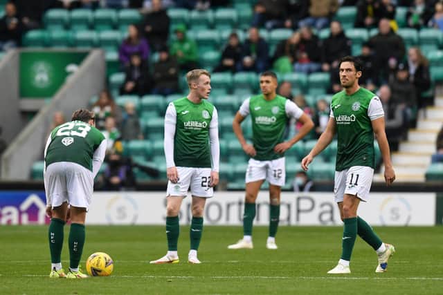 Hibs players prepare to take centre after conceding to Dundee United in the 3-0 defeat at Easter Road. (Photo by Ross MacDonald / SNS Group)