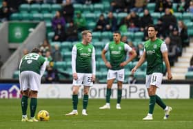 Hibs players prepare to take centre after conceding to Dundee United in the 3-0 defeat at Easter Road. (Photo by Ross MacDonald / SNS Group)