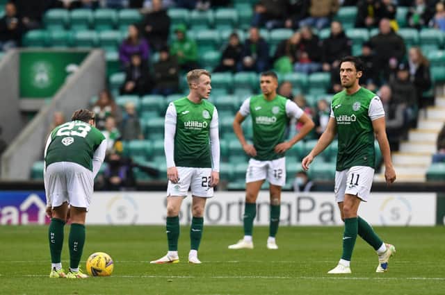 Hibs players prepare to take centre after conceding to Dundee United in the 3-0 defeat at Easter Road. (Photo by Ross MacDonald / SNS Group)