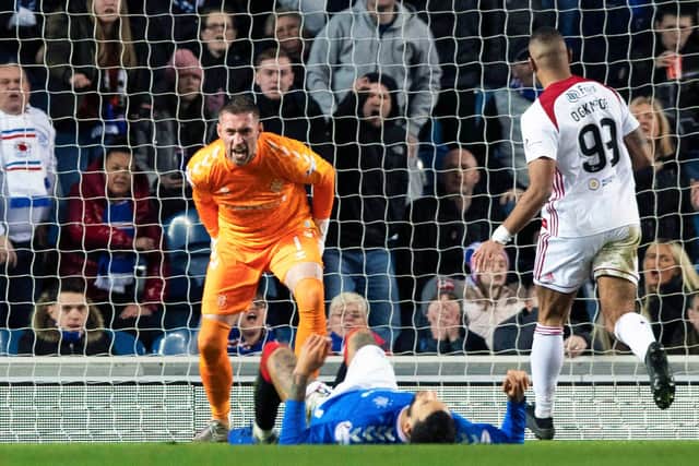 Rangers' Allan McGregor vents his frustration at team-mate Connor Goldson after Hamilton's goal on Wednesday evening. Picture: SNS