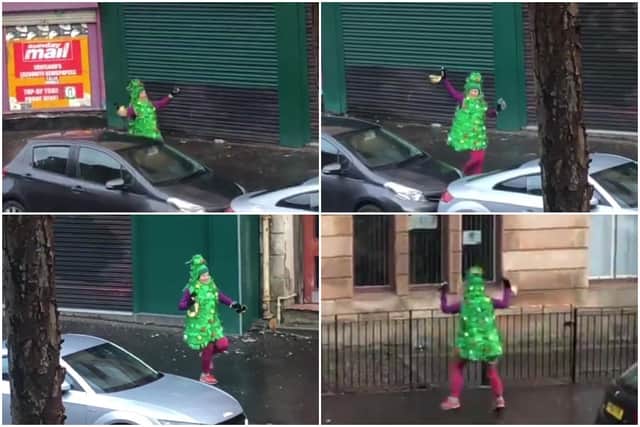 A woman has been spotted spreading festive cheer to Glasgow residents while dancing in the streets dressed as a Christmas tree.