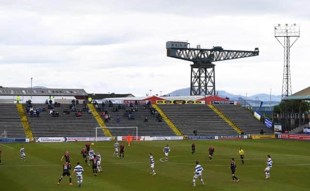 Morton supporters watch from the Wee Dublin End of Cappielow Park as their team defeat Airdrieonians in the Scottish Championship play-off final. (Photo by Ross MacDonald / SNS Group)