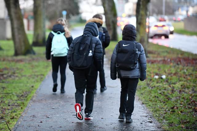 Pupils making their way to school. Picture: Michael Gillen