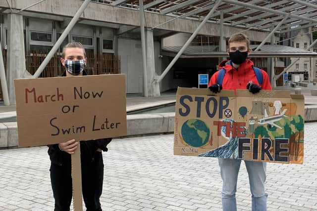 Demonstrators taking part in a climate change protest outside Scottish Parliament, Edinburgh picture: Emma O'Neill/PA Wire