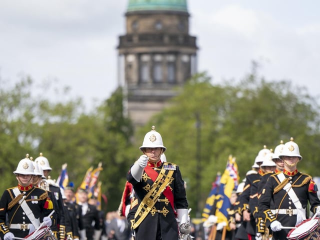 The Royal Marines Band lead Falklands veterans and members of the wider armed forces community, during a parade and service of remembrance to remember the 40th anniversary of the end of the conflict, in Edinburgh.