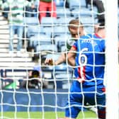 Inverness CT's Josh Meekings handles a header from Celtic's Leigh Griffiths in the 2015 Scottish Cup final.