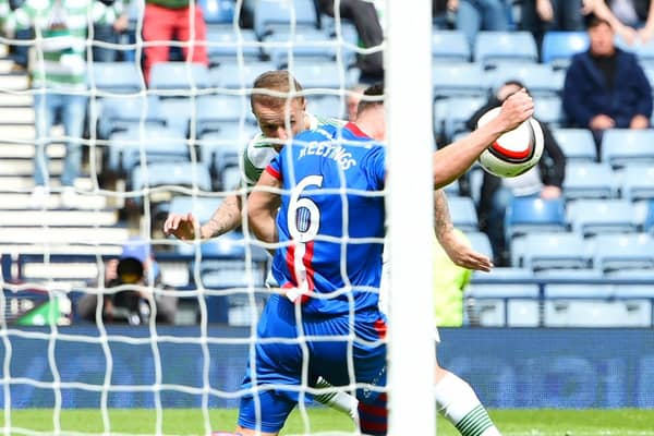 Inverness CT's Josh Meekings handles a header from Celtic's Leigh Griffiths in the 2015 Scottish Cup final.