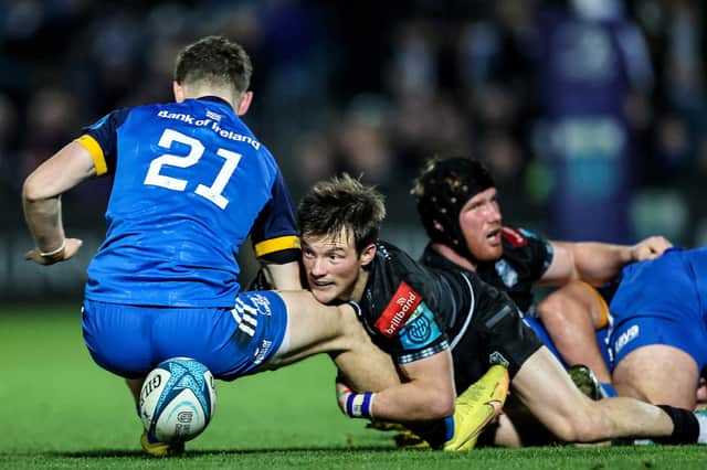 Leinster's Cormac Foley and Glasgow Warriors' George Horne challenge for the ball. Photo by Billy Stickland/INPHO/Shutterstock.