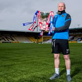 Livingston manager David Martindale holds the Betfred Cup prior to Sunday's final against St Johnstone. He revealed he will not be wearing a suit (Photo by Ross Parker / SNS Group)