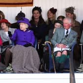 Queen Elizabeth II, along with the Prince of Wales (Duke of Rothesay), and the Duchess of Cornwall, during the Braemar Royal Highland Gathering. Picture: Andrew Milligan/PA Wire
