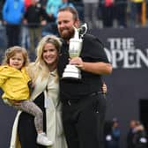 Shane Lowry celebrates with his wife Wendy and daughter Iris after his victory in last year's Open Championship at Royal Portrush. Picture: Getty Images