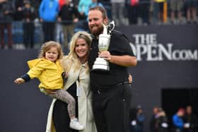 Shane Lowry celebrates with his wife Wendy and daughter Iris after his victory in last year's Open Championship at Royal Portrush. Picture: Getty Images