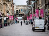A relatively empty Buchanan Street in Glasgow as people observe the early phases of lockdown in Scotland. Picture: John Devlin