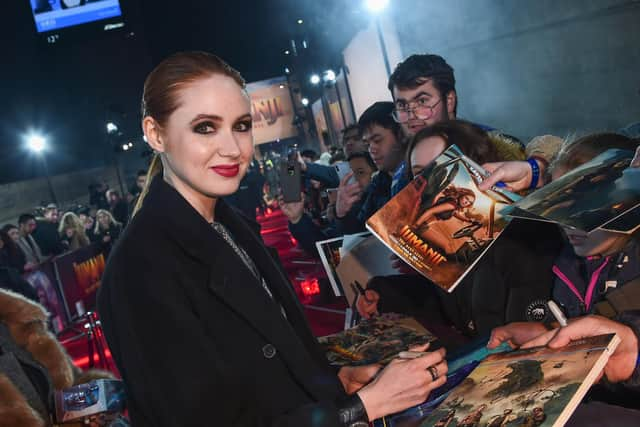 Karen Gillan signs autographs at the London premiere of Jumanji: The Next Level.