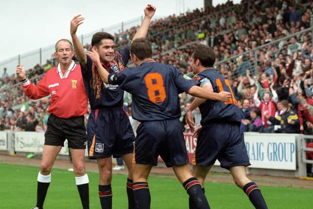 Peter Hetherston (arms raised) celebrates an Aberdeen goal against Celtic in 1995 with teammates Eoin Jess (No. 8) and current Aberdeen manager Stephen Glass (11)