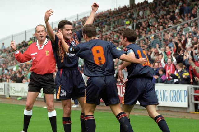Peter Hetherston (arms raised) celebrates an Aberdeen goal against Celtic in 1995 with teammates Eoin Jess (No. 8) and current Aberdeen manager Stephen Glass (11)
