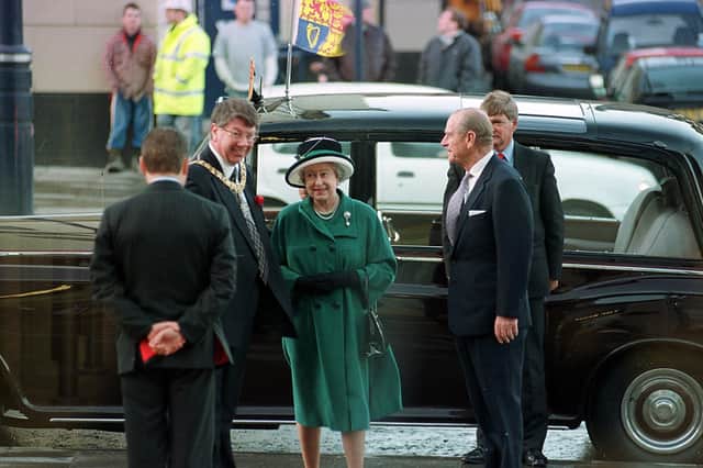 Queen Elizabeth and the Duke of Edinburgh arrive for the opening of the former headquarters of The Scotsman in 1999 (Picture: Ian Rutherford)