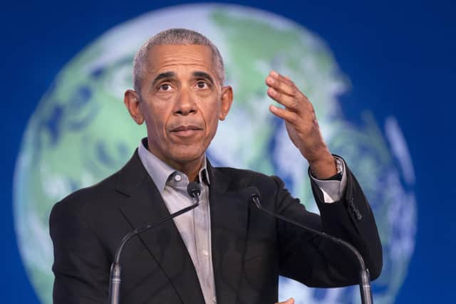 Former US president Barack Obama delivers a speech to delegates during the Cop26 summit at the Scottish Event Campus (SEC) in Glasgow.