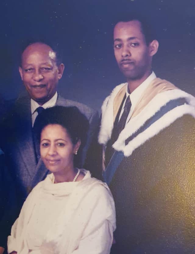 Demissie Asafa Demissie, now 56, pictured after graduating from the University of Strathclyde with his dad Asafa Demissie and mum Turuwork Agonafir, who themselves both studied in Scotland