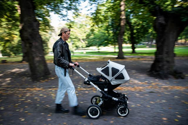 Fathers could use more paternity leave to help look after their babies (Picture: Jonathan Nackstrand/AFP via Getty Images)