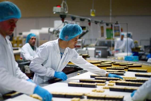 Employees work in the Walkers shortbread factory in Aberlour. Picture: Jeff J Mitchell/Getty Images
