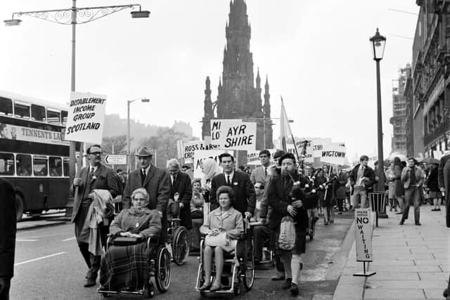 The "March on Wheels" protest along Princes Street in Edinburgh, which was organised by Dr Margaret Blackwood, who led the fight for equal rights for disabled people. Dr Blackwood will feature in a new exhibition which celebrates the achievements of lesser-known Scots who fought for change. PIC: HES.