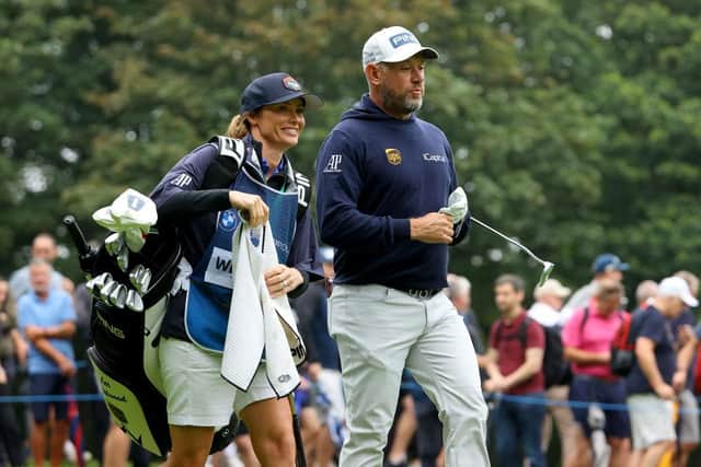 Lee Westwood and his wife/caddie Helen during the second round of the BMW PGA Championship at Wentworth. Picture: Andrew Redington/Getty Images.