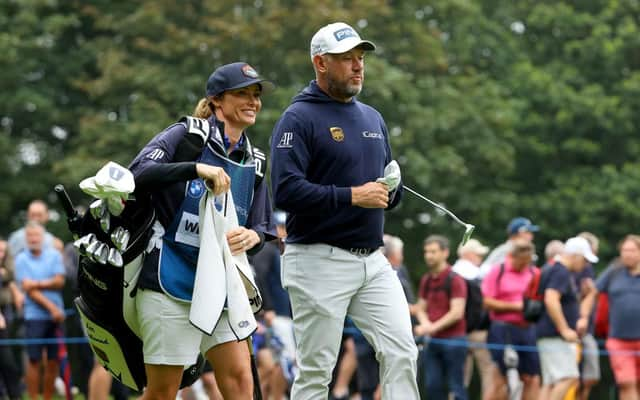 Lee Westwood and his wife/caddie Helen during the second round of the BMW PGA Championship at Wentworth. Picture: Andrew Redington/Getty Images.