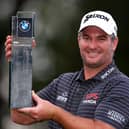 Ryan Fox shows off the trophy after winning the BMW PGA Championship at Wentworth Club in Virginia Water. PIcture: Richard Heathcote/Getty Images.