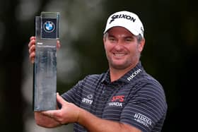 Ryan Fox shows off the trophy after winning the BMW PGA Championship at Wentworth Club in Virginia Water. PIcture: Richard Heathcote/Getty Images.