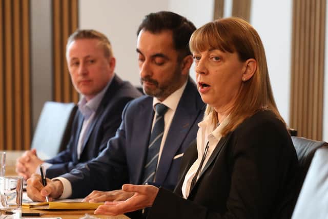Linda and Stuart Allan, the parents of Katie Allan, and their lawyer Aamer Anwar (centre) speak at a press conference. Picture: Andrew Milligan/PA Wire