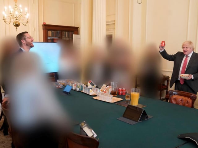 Boris Johnson seemingly raises a toast during the gathering for his birthday on June 19th, 2020.