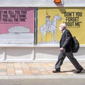 Posters with the message "keep looking out for each other Glasgow" and featuring song lyrics by Scottish artists such as Simple Minds, Dougie MacLean and Stealers Wheel have appeared around Glasgow city centre.