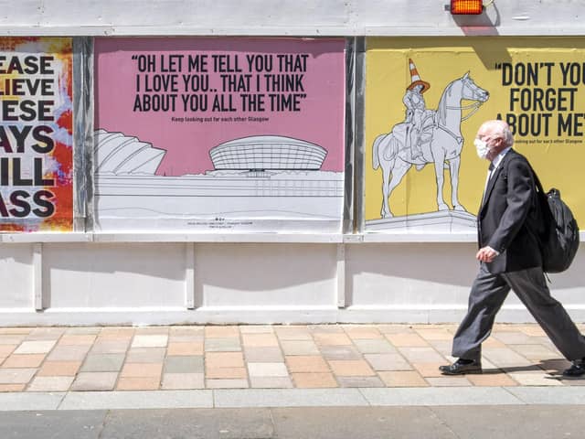 Posters with the message "keep looking out for each other Glasgow" and featuring song lyrics by Scottish artists such as Simple Minds, Dougie MacLean and Stealers Wheel have appeared around Glasgow city centre.