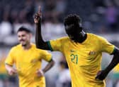 Hearts' Garang Kuol celebrates his first goal for Australia during the 3-1 win over Ecuador in Sydney on Friday. Photo by Damian Briggs/Speed Media/Shutterstock