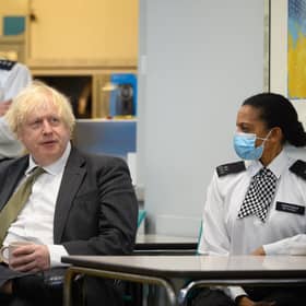 Prime Minster Boris Johnson speaks with members of the Metropolitan Police. Picture: Leon Neal/Getty Images