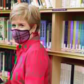 First Minister Nicola Sturgeon is a voracious reader who would surely mourn the loss of libraries (Picture: Robert Perry - WPA Pool/Getty Images)