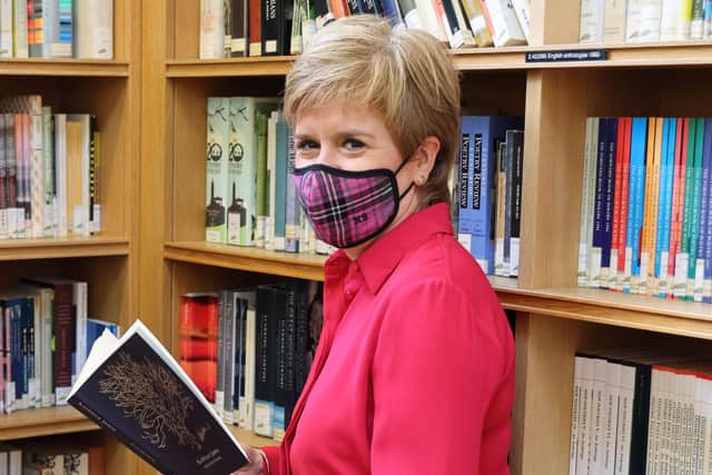 First Minister Nicola Sturgeon is a voracious reader who would surely mourn the loss of libraries (Picture: Robert Perry - WPA Pool/Getty Images)