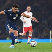 Scotland's Che Adams has a shot on goal against Poland in a friendly that finished 1-1 and raised funds for UNICEF's humanitarian appeal in Ukraine. (Photo by Craig Foy / SNS Group)