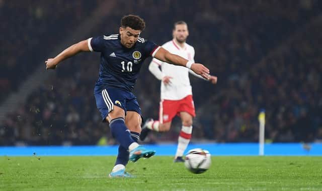 Scotland's Che Adams has a shot on goal against Poland in a friendly that finished 1-1 and raised funds for UNICEF's humanitarian appeal in Ukraine. (Photo by Craig Foy / SNS Group)