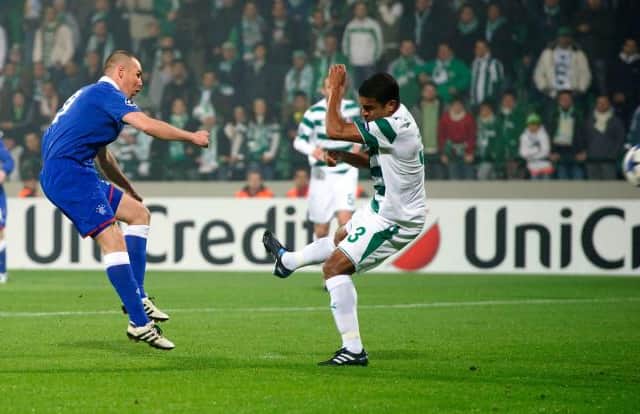 Kenny Miller scores for Rangers against Bursaspor in Turkey on December 7, 2010 - the last time the Ibrox club played a group stage match in the Champions League. (Photo by SNS Group).