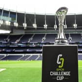 The EPCR Challenge Cup trophy on display at Tottenham Hotspur Stadium as the Sharks mascot walking past prior to the final against Gloucester on May 23. (Photo by Patrick Khachfe/Getty Images)