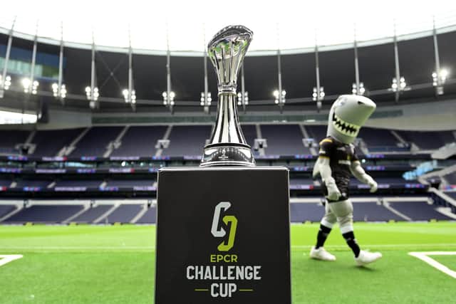 The EPCR Challenge Cup trophy on display at Tottenham Hotspur Stadium as the Sharks mascot walking past prior to the final against Gloucester on May 23. (Photo by Patrick Khachfe/Getty Images)