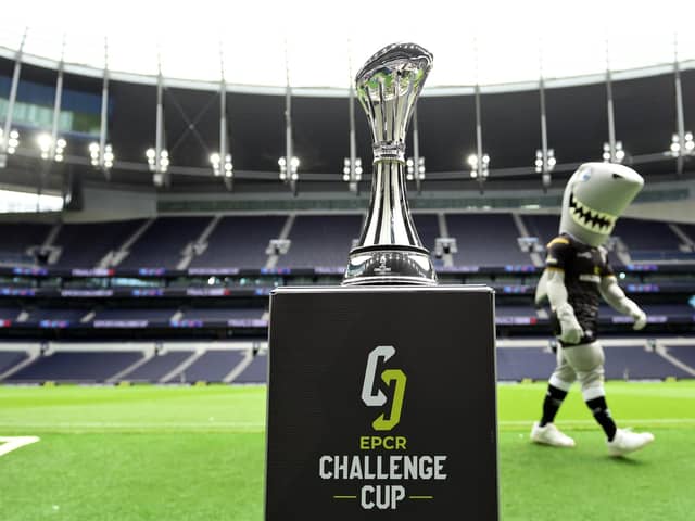 The EPCR Challenge Cup trophy on display at Tottenham Hotspur Stadium as the Sharks mascot walking past prior to the final against Gloucester on May 23. (Photo by Patrick Khachfe/Getty Images)