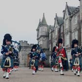 The pipes and drums perform at Balmoral Castle to celebrate the Coronation of King Charles the III and Queen Camilla. Picture: Katharine Hay