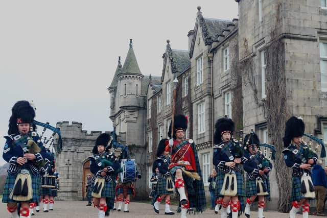 The pipes and drums perform at Balmoral Castle to celebrate the Coronation of King Charles the III and Queen Camilla. Picture: Katharine Hay