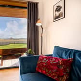 The sumptuous, 'coorie'-infused eco-cabin boasts magnificent views of Duffus Castle.