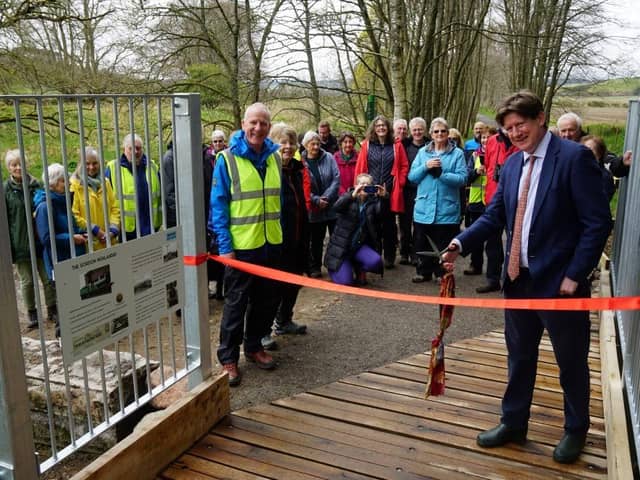 Alexander Burnett MSP did the honours and declares the path open.